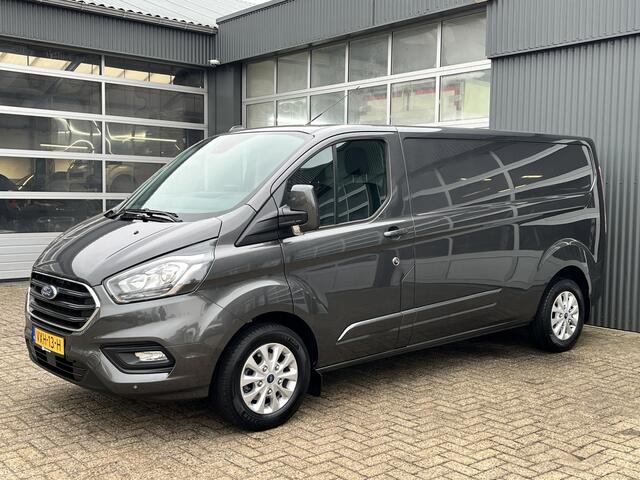 Ford TRANSIT CUSTOM 320 2.0 TDCI L2H1 Limited Airco Cruise control 3-Persoons Stoelverwarming Telefoonverbinding Navigatiesysteem Parkeersensoren voor en achter Schuifdeur Euro 6