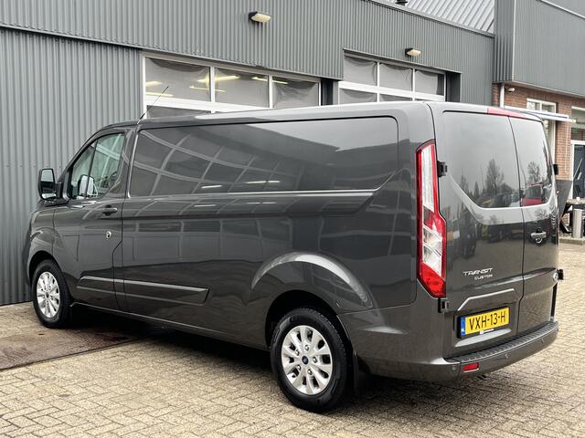 Ford TRANSIT CUSTOM 320 2.0 TDCI L2H1 Limited Airco Cruise control 3-Persoons Stoelverwarming Telefoonverbinding Navigatiesysteem Parkeersensoren voor en achter Schuifdeur Euro 6
