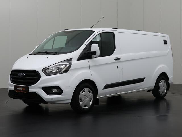 Ford TRANSIT CUSTOM 2.0TDCi 130PK Lang | Werkplaat inrichting | Dakdraagsysteem | Navigatie | Camera | Trekhaak | Airco | 3-Zits