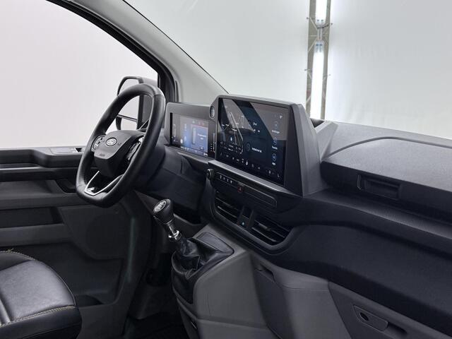 Ford TRANSIT CUSTOM 320 | 2.0 TDCI | L2 H1 | TRAIL | DUBBEL CABINE | LEDEREN BEKLEDING | DUBBELE ZIJSCHUIFDEUREN | PARKEERCAMERA | DODEHOEK DETECTIE | ADAPTIEVE CRUISE | APPLE CARPLAY / ANDROID AUTO | STOELVERWARMING | STUURWIELVERWARMING