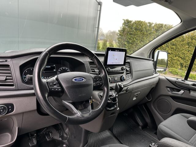 Ford TRANSIT CUSTOM 2.0 TDCI / L1H1 / 1e EIG. / 2.500 KG AHG / CAMERA / TREKHAAK / CRUISE / AIRCO / NAVI / STOELVERW.