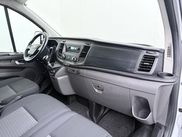 Ford TRANSIT CUSTOM 280 2.0TDCI L1H1 Trend 3-Persoons Trekhaak Airco Cruise Control Bluetooth Pdc Betonplex vloer Wandbetimmering Kasteninbouw Achterdeuren Schuifdeur 1e Eigenaar Euro 6 Origineel Nederlandse Auto