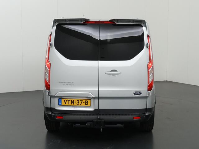 Ford TRANSIT CUSTOM 320 2.0 TDCI | L2 H1 | Active | Dubbele Cabine | Schuifdeur L + R | Trekhaak | LM Velgen | Treeplanken | 5-zits | Parkeercamera | Navigatie