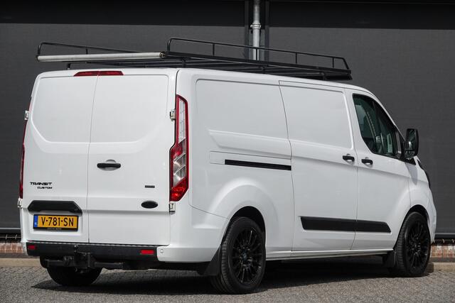 Ford TRANSIT CUSTOM L2H1 | 2.0Tdci 105Pk | Trend | Achteruitrijcamera | Imperiaal | Aluca Stelling | Trekhaak | Raptor Grille | 18"