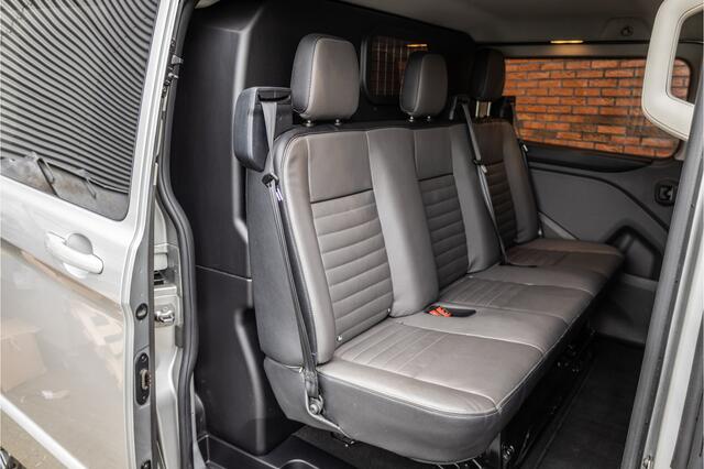 Ford TRANSIT CUSTOM 300 2.0 TDCI L2H1 Limited DC | Dubbel cabine | Lederen bekleding | 6-Zitter | Elek stoelen | Navigatie | CarPlay | Camera | DAB | Dodehoekdetectie | Nieuwe APK | Dealer onderhouden | Euro 6 | BPM Vrij