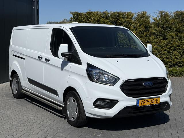 Ford TRANSIT CUSTOM 2.0 TDCI 130 PK / L2H1 / TREKHAAK / AIRCO / CRUISE / STOELVERW / 2800 KG AHG