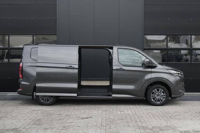 Ford TRANSIT CUSTOM E-Transit 340 L2H1 Limited 71 kWh 218pk | 2x Schuif | DDS LED | 360 Camera | B&O | ACC | Navi | Verwarmd stuurwiel | Elek trekhaak | AGR-stoel | Rijklaar
