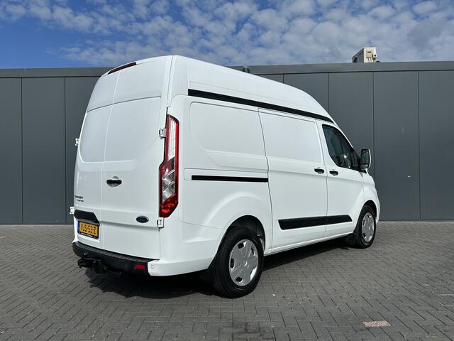 Ford TRANSIT CUSTOM 2.0 TDCI 130 PK AUTOMAAT / L1H2 / 1e EIG. / TREKHAAK / CAMERA / AIRCO / CRUISE / CARPLAY