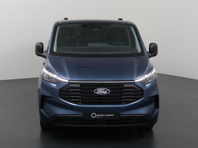 Ford TRANSIT CUSTOM 320 | 2.0 TDCI | L2 H1 | TREND | PARKEERCAMERA | APPLE CARPLAY | ANDROID AUTO | 3-ZITS | CLIMATE CONTROL | VOORRUITVERWARMING | CRUISE CONTROL | METALLIC LAK CHROME BLUE