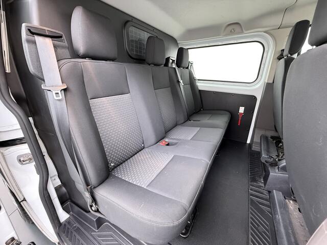 Ford TRANSIT CUSTOM 300 2.0TDCI 130PK Dubbele Cabine L2H1 Trekhaak Navi Camera Airco Cruise Control Pdc Trend DC Schuifdeur Betonplex Vloer Wandbetimmering Bott Inbouwkast Lane Assist 2.800KG Trekgewicht 1e Eigenaar
