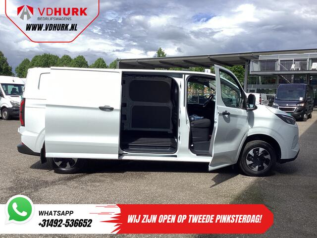 Ford TRANSIT CUSTOM E-Transit 71 kWh L2 360 km WLTP Garantie t/m 2028/ LED/ Snellader/ Standkachel/ Stoelverw./ Stuurverw./ Carplay/ Camera/ PDC/ Climate/ Cruise