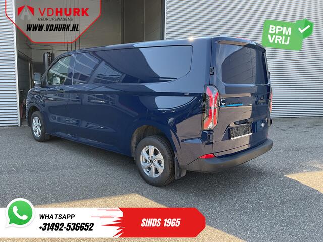 Ford TRANSIT CUSTOM E-Transit L2 71 Kwh 370 km WLTP Garantie t/m 06-'29/ LED/ Snellader/ Standkachel/ Stoelverw./ Stuurverw./ Carplay/ Camera/ PDC/ Climate/ Cruise/ 16"LMV
