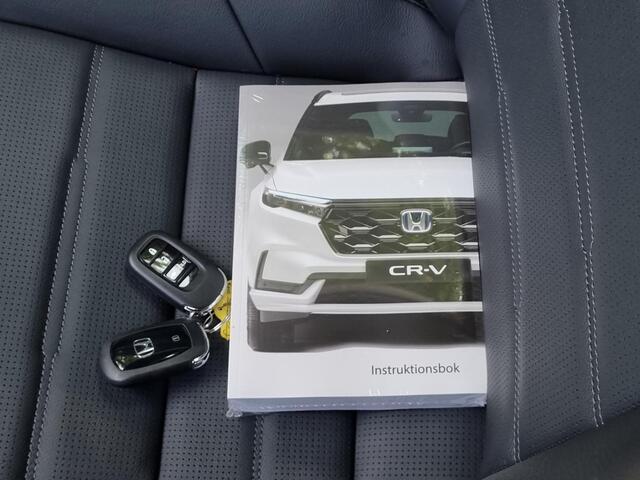 Honda CR-V 2.0 e:PHEV Advance Tech Automaat / 1500kg Trekgewicht / Schuif-/Kanteldak / Panoramadak / Cruise Control Adaptief / Rondomzicht Camera / Lederen Bekleding / Elekt. Achterklep