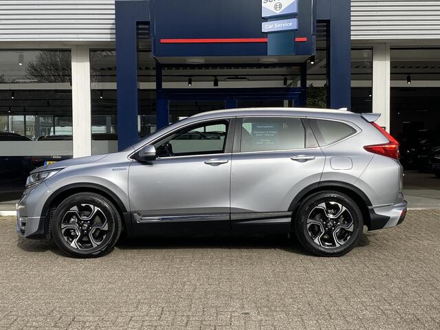 Honda CR-V 2.0 Hybrid Business Edition / Automaat / NL-Auto / Adaptieve Cruise-Control / Stoelverwarming / Trekhaak / Climate-Control / Apple-Carplay & Android-Auto / DAB Radio-Bluetooth / Navi / PDC V+A met Camera / 18'' LMV / ENZ.