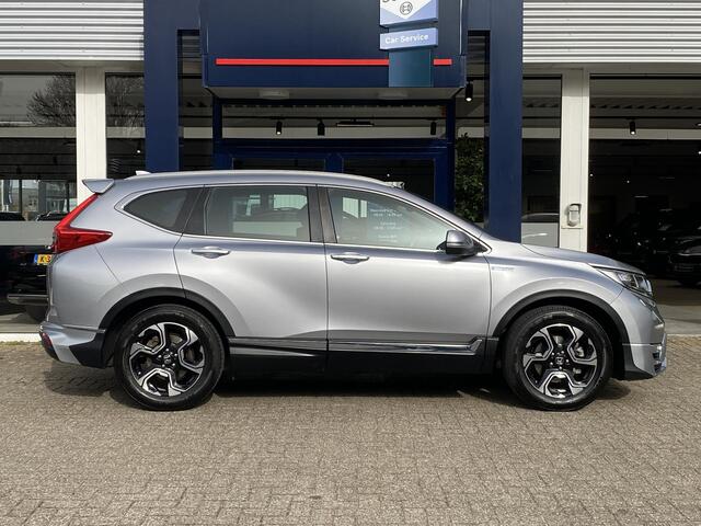 Honda CR-V 2.0 Hybrid Business Edition / Automaat / NL-Auto / Adaptieve Cruise-Control / Stoelverwarming / Trekhaak / Climate-Control / Apple-Carplay & Android-Auto / DAB Radio-Bluetooth / Navi / PDC V+A met Camera / 18'' LMV / ENZ.