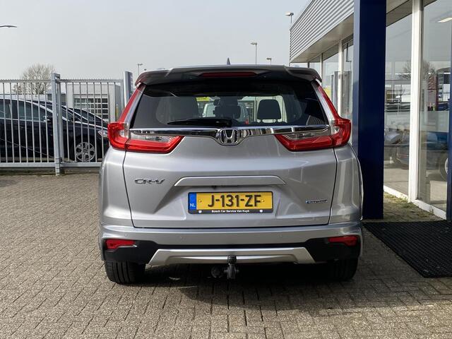Honda CR-V 2.0 Hybrid Business Edition / Automaat / NL-Auto / Adaptieve Cruise-Control / Stoelverwarming / Trekhaak / Climate-Control / Apple-Carplay & Android-Auto / DAB Radio-Bluetooth / Navi / PDC V+A met Camera / 18'' LMV / ENZ.