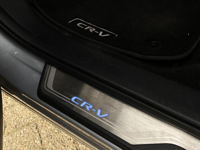 Honda CR-V 2.0 Hybrid Business Edition / Automaat / NL-Auto / Adaptieve Cruise-Control / Stoelverwarming / Trekhaak / Climate-Control / Apple-Carplay & Android-Auto / DAB Radio-Bluetooth / Navi / PDC V+A met Camera / 18'' LMV / ENZ.