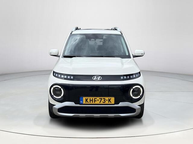 Hyundai INSTER Evolve Sky 49 kWh | Winter Pack | Apple Carplay/Android Auto | Achteruitrijcamera | Batterijverwarming | Schuif/kantel dakje | Adaptief Cruise Control | Stoel/stuurverwarming |