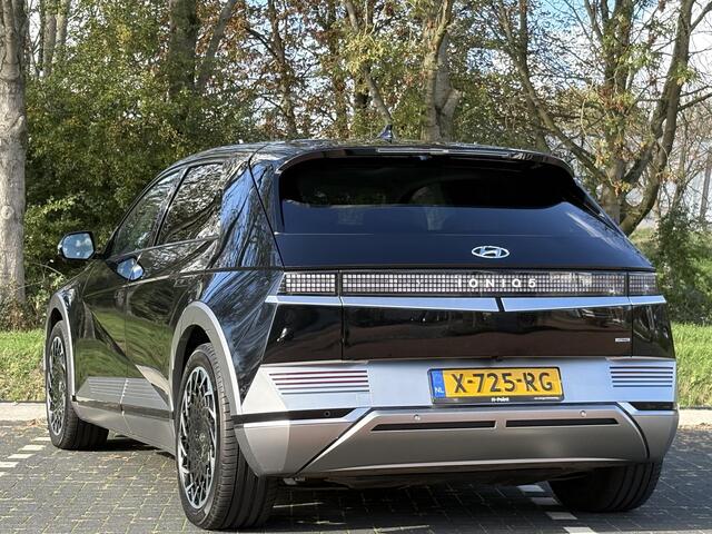 Hyundai IONIQ 5 Lounge AWD 77.4 kWh | Panoramadak | Lederen bekleding & memory functie | Warmtepomp & V2L | Geïntegreerde navigatie | Apple Carplay & Android Auto | Adaptieve Cruisecontrol | Camera | Warmtepomp | Stoel & stuur verwarming | Premium audio BOSE |