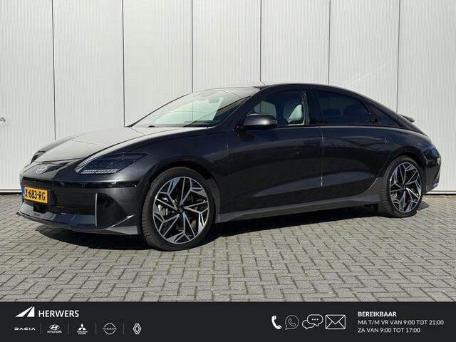 Hyundai IONIQ 6 Lounge 77.4 kWh / NL Auto / 10-2029 Fabrieksgarantie / SOH 100 % / Trekhaak afneembaar 1.500 kg / WLTP 545 km / Warmtepomp / Wit Leder / HUD / Camera 360° /