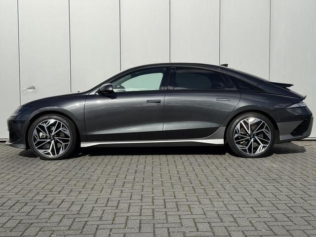 Hyundai IONIQ 6 Lounge 77.4 kWh / NL Auto / 10-2029 Fabrieksgarantie / SOH 100 % / Trekhaak afneembaar 1.500 kg / WLTP 545 km / Warmtepomp / Wit Leder / HUD / Camera 360° /