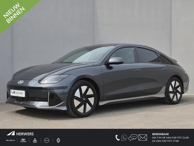 Hyundai IONIQ 6 Lounge 77.4 kWh Automaat / SOH 100% / Fabrieksgarantie tot 03-2028 / Dealer onderhouden / CCS snellader / Elektrische stoelen met Relax / Head Up Display / warmtepomp / Camera / Apple Carplay Android / 18" LM wielen / Stuur- Stoel & Achterbank verwarmin