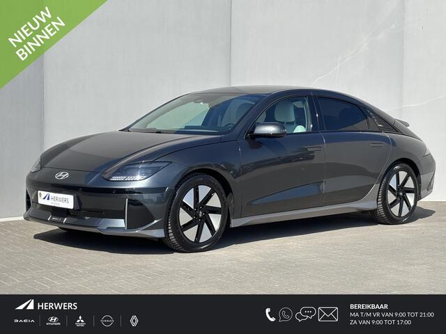 Hyundai IONIQ 6 Connect 77.4 kWh / SOH 100% / Fabrieksgarantie tot 11-2028 / CCS snellader / All season banden / Elektrisch verstelbare stoel / Stuur-, Stoel & Achterbankverwarming / warmtepomp / Trekgewicht 1500 kg / Keyless Entry/Start /