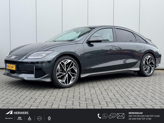 Hyundai IONIQ 6 Connect 77.4 kWh / SOH 100% / Fabrieksgarantie tot 11-2028 / Wit Leder / 20 Inch All Season / Stoelverkoeling / Stoelverwarming Voor + Achter / Stuurverwarming / Elek. Bedienbare Bestuurdersstoel /