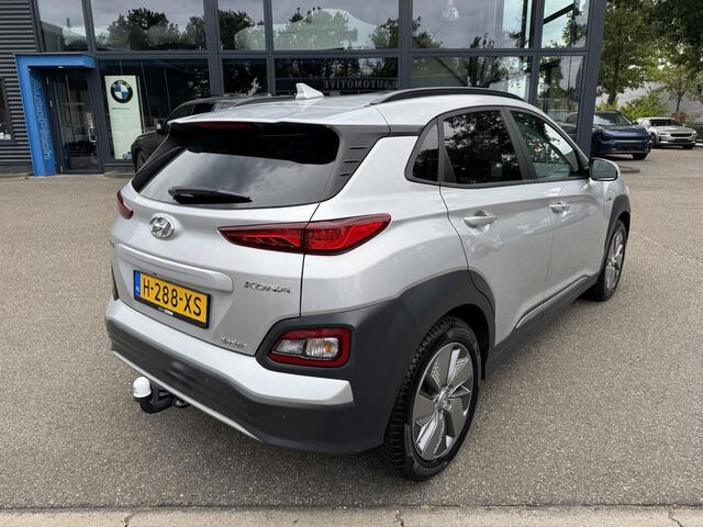 Hyundai Kona EV Premium 64 kWh 3-FASE LADER | ORIGINEEL NL AUTO MET NAP | SCHUIFDAK | LEDER | STOELVERWARMING & VERKOELING | HEAD-UP DISPLAY | AFN.TREKHAAK | RIJKLAAR MET 12 MAANDEN BOVAG GARANTIE!