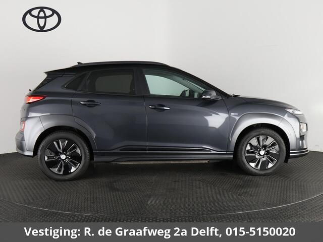 Hyundai Kona EV Premium Two-Tone 64 kWh | Accuconditie: 92% | Navigatie | Leder |