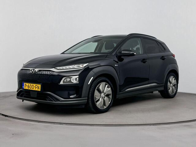 Hyundai Kona EV Comfort Smart 64 kWh | Navigatie met Apple Carplay/Android Auto | Warmtepomp | Stoel en stuurwiel verwarming | climate control | Soh 95,3% |