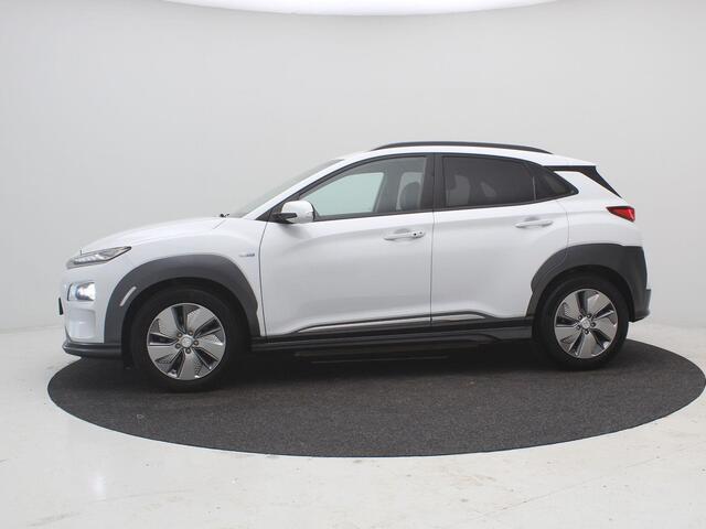 Hyundai Kona EV Fashion 64 kWh / SOH 100% / Lederen Bekleding / Navigatie / KRELL Audio / Adaptive Cruise Control / Climate Control / Achteruitrijcamera /