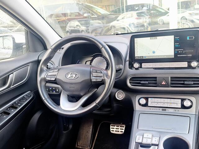 Hyundai Kona EV Fashion 64 kWh | SOH: nnb | 3 Fase | Warmtepomp | HUD | Navi | Adaptive CC | Blindspot |