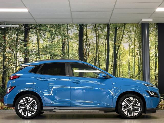 Hyundai Kona EV Comfort Smart 39 kWh | SOH 100% | Standkachel | Krell Sound | Camera | Stuurwielverwarming | Stoelverwarming | Lane Assist | Dodehoeksensor | Adaptieve Cruise Control | DAB |