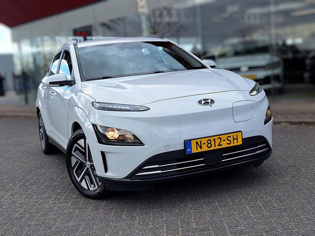 Hyundai Kona EV Fashion 64 kWh | SOH: nnb | 3 Fase | Warmtepomp | Blindspot | Navi | Camera |