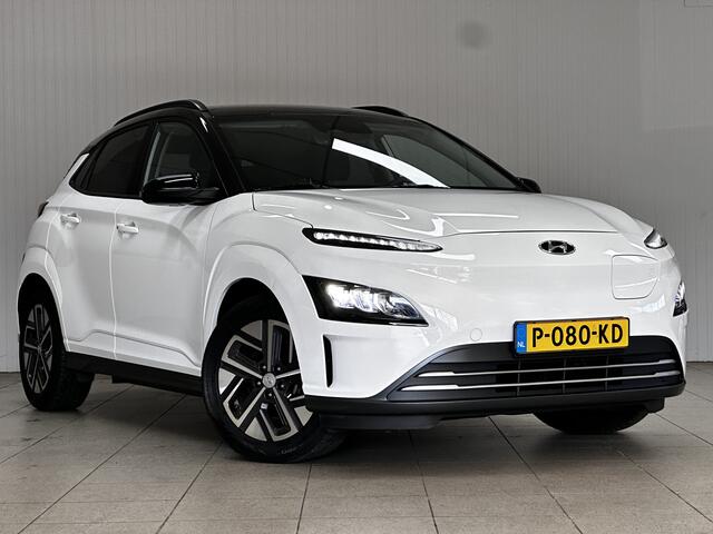 Hyundai Kona EV Fashion 64 kWh/ Two-Tone/ 17'' LMV/ LED Koplampen/ Keyless/ Virtual Dashb./ Apple + Android/ Adaptive Cruise/ Camera/ Lane-Assist./ Navi/ DAB+/ Dode-Hoek DET./ Extra getint glas.