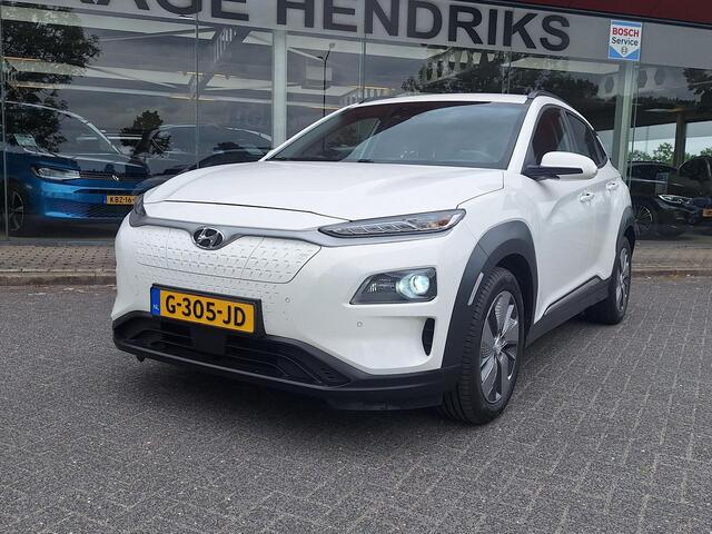 Hyundai Kona EV Premium 64 kWh | SOH: nnb | Warmtepomp | Lage km-stand | Leder | HUD | Blindspot | Full LED |
