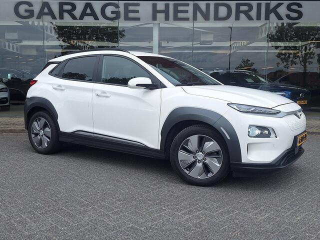 Hyundai Kona EV Premium 64 kWh | SOH: nnb | Warmtepomp | Lage km-stand | Leder | HUD | Blindspot | Full LED |