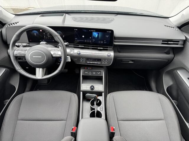 Hyundai Kona Electric Comfort Smart 65.4 kWh / Fabrieksgarantie tot 9-2030 / SOH 100% / Stuur- & Stoel verwarming / Achteruitrijcamera / Apple Carplay Android Auto / Keyless Entry/Start / Adaptief cruise control / Climate control /