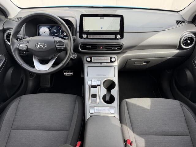 Hyundai Kona EV Comfort 64 kWh / Accu SOH 100% / Volledig Onderhouden / 8 Jaar Batterij Garantie / Adaptieve Cruise / Navigatie / Warmtepomp / Krell Audio / Camera / PDC /