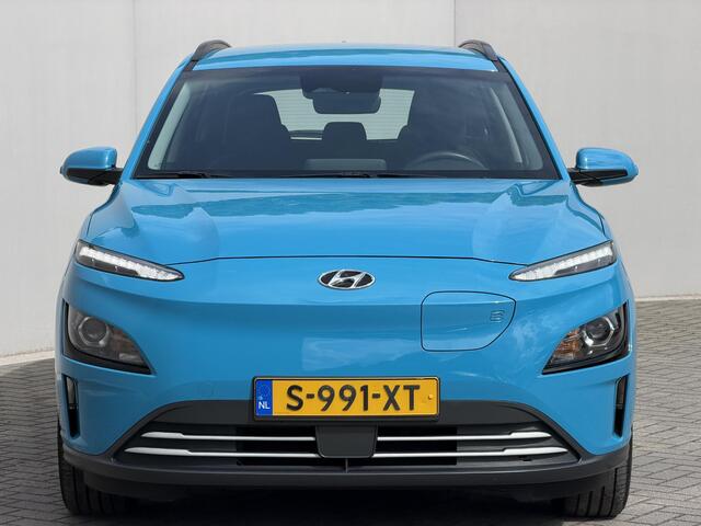Hyundai Kona EV Comfort 64 kWh / Accu SOH 100% / Volledig Onderhouden / 8 Jaar Batterij Garantie / Adaptieve Cruise / Navigatie / Warmtepomp / Krell Audio / Camera / PDC /