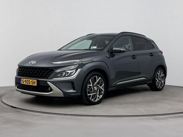 Hyundai Kona 1.6 GDI HEV Premium | Trekhaak 1300kg | Achteruitrij camera | All season banden | Stoel & stuur verwarming | Elektrische stoelen | Adaptive cruise | Dodehoek detectie |