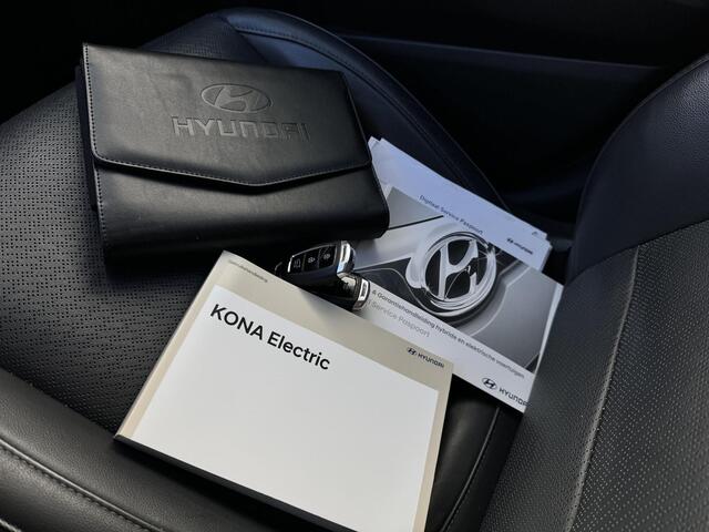 Hyundai Kona EV Premium 64 kWh / SOH 99,7% / Stoelverwarming en verkoeling / Airco / Apple CarPlay/Android Auto / Cruise Control / Navigatie /