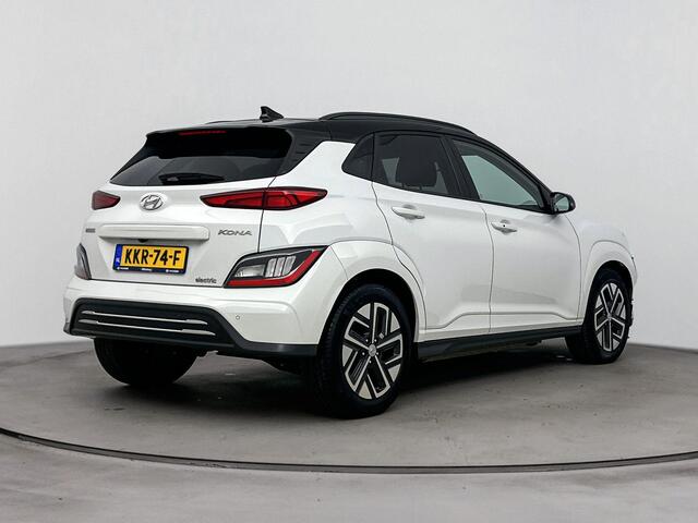 Hyundai Kona EV Fashion 64 kWh | SOH 96% | Dodehoek detectie | Navigatie | Achteruitrij camera | Stoelverwarming | Head up display |
