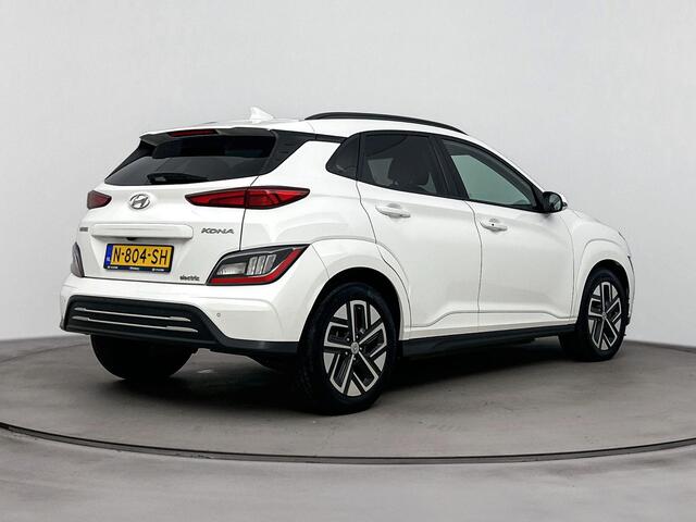Hyundai Kona EV Fashion 64 kWh |SOH 95.7% | Dodehoek detectie | Navigatie | Achteruitrij camera | Head up display | Apple carplay/adnroid |