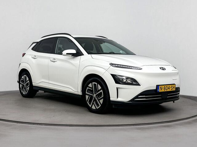 Hyundai Kona EV Fashion 64 kWh |SOH 95.7% | Dodehoek detectie | Navigatie | Achteruitrij camera | Head up display | Apple carplay/adnroid |