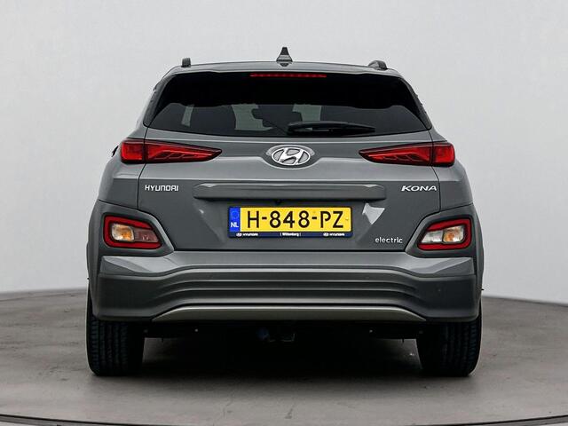 Hyundai Kona EV Premium 64 kWh | SOH 95.2% | Trekhaak fietsendrager | Stoelverwarming & verkoeling | Achteruitrij camera |