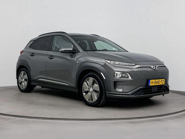Hyundai Kona EV Premium 64 kWh | SOH 95.2% | Trekhaak fietsendrager | Stoelverwarming & verkoeling | Achteruitrij camera |