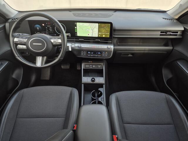 Hyundai Kona 1.6 GDI HEV Comfort Smart Automaat / Fabrieksgarantie tot 1-2030 / Stuur- & Stoel verwarming / Achteruitrijcamera / Apple Carplay Android Auto / Keyless Entry/Start / Adaptief cruise control / Draadloze telefoon lader / Climate control /