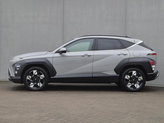 Hyundai Kona 1.6 GDI HEV Comfort Smart Automaat / Fabrieksgarantie tot 1-2030 / Stuur- & Stoel verwarming / Achteruitrijcamera / Apple Carplay Android Auto / Keyless Entry/Start / Adaptief cruise control / Draadloze telefoon lader / Climate control /